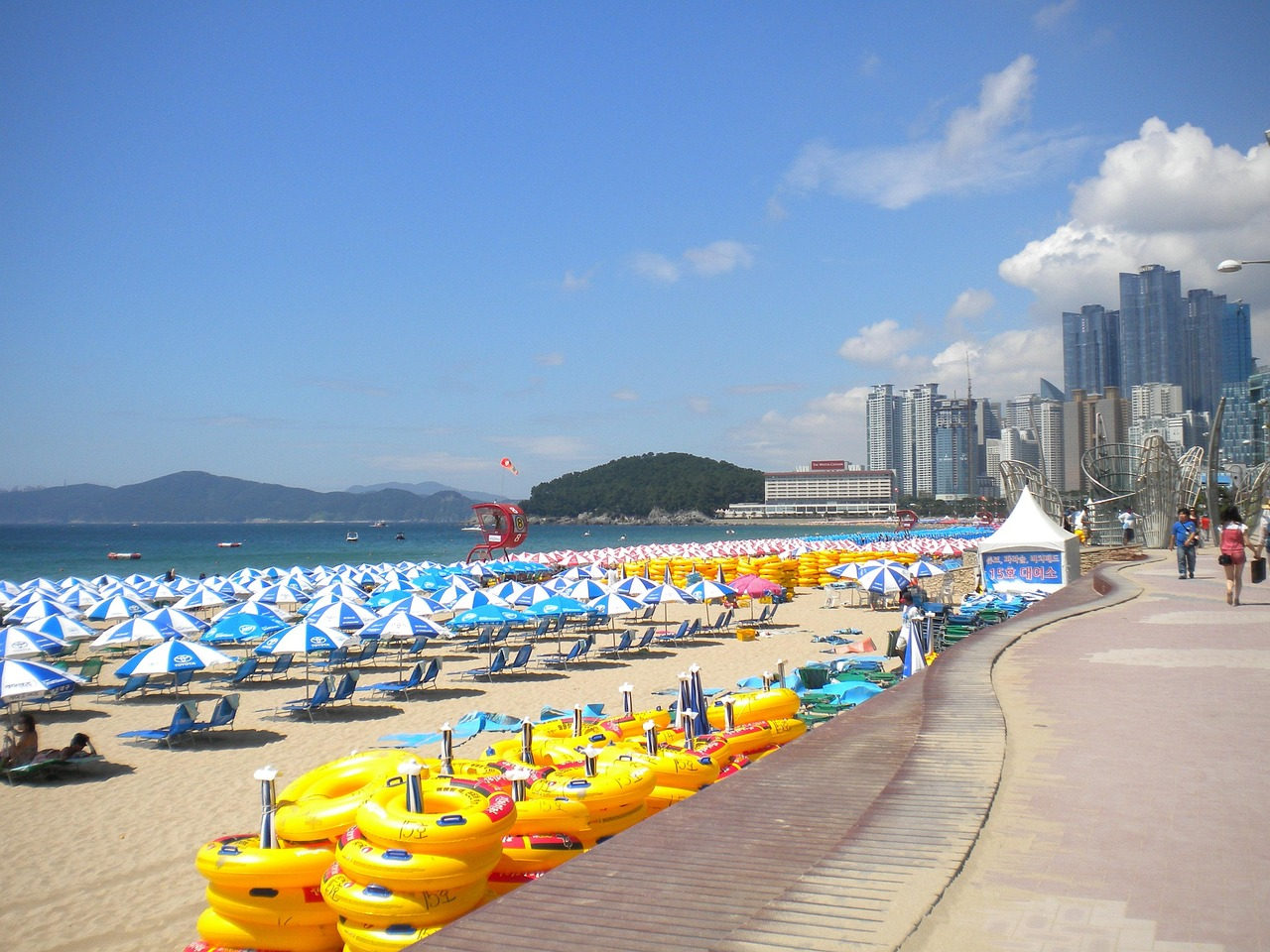Haeundae Beach in Busan Korea showing coastal tourism destination with ocean views sandy shore and beach umbrellas for Korean regional travel