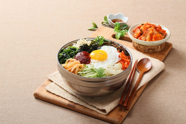 Traditional Korean bibimbap bowl with colorful vegetables and gochujang