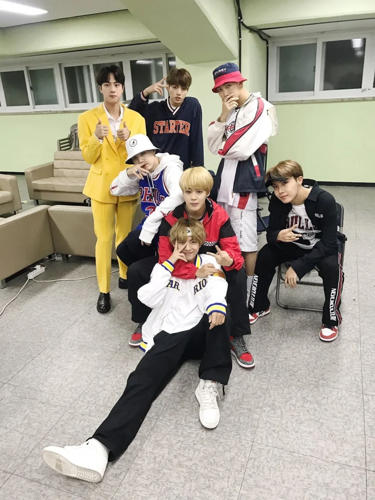 BTS members in a group photo for their ARIRANG album comeback